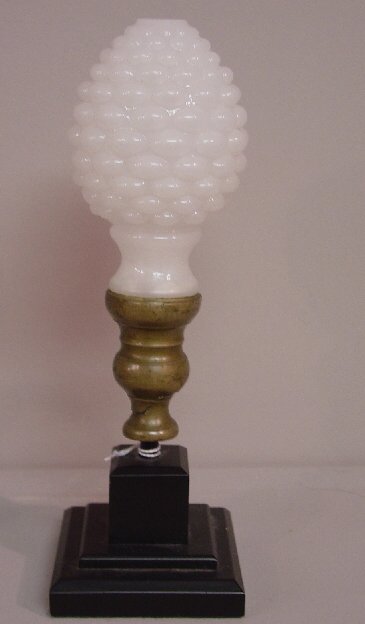 NEWEL POST FINIAL. Brass ferule with a c: NEWEL POST FINIAL. Brass ferule with a clambroth hobnail glass top. Brass has splits. 7 1/2"h. plus later wooden base.