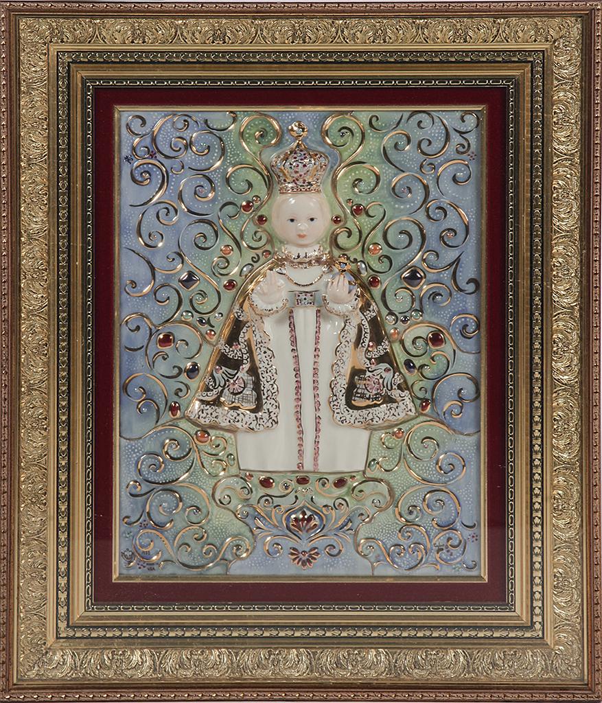 CYBIS "THE HOLY CHILD OF PRAGUE" PLAQUE.: American, 4th quarter 20th century. Porcelain relief plaque with lusters and gold detail. Signed, dated and numbered 1980, 8/25. 15.5"h. 12"w., framed, 23.25"h. 19.25"w.