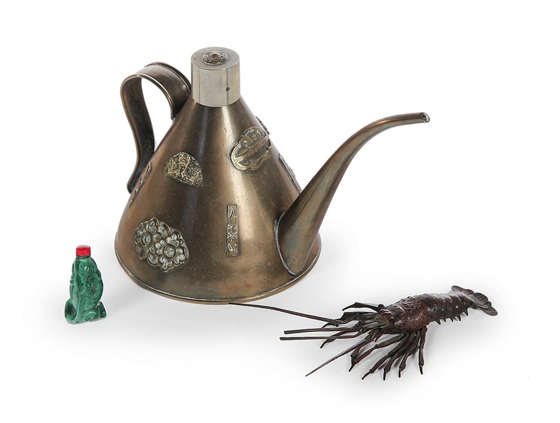 THREE ITEMS.: Twentieth century. Chinese malachite koi shaped snuff bottle. 2.25”h. and a Japanese articulated copper miniature lobster. Signed. 7”l. overall. Together with a Middle Eastern brass oil la