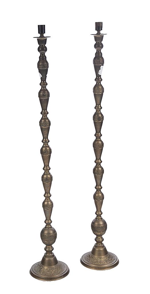 PAIR OF ASIAN BRASS TORCHIERE BASES.: Late 20th century. Cast decorative bands. 55”h.