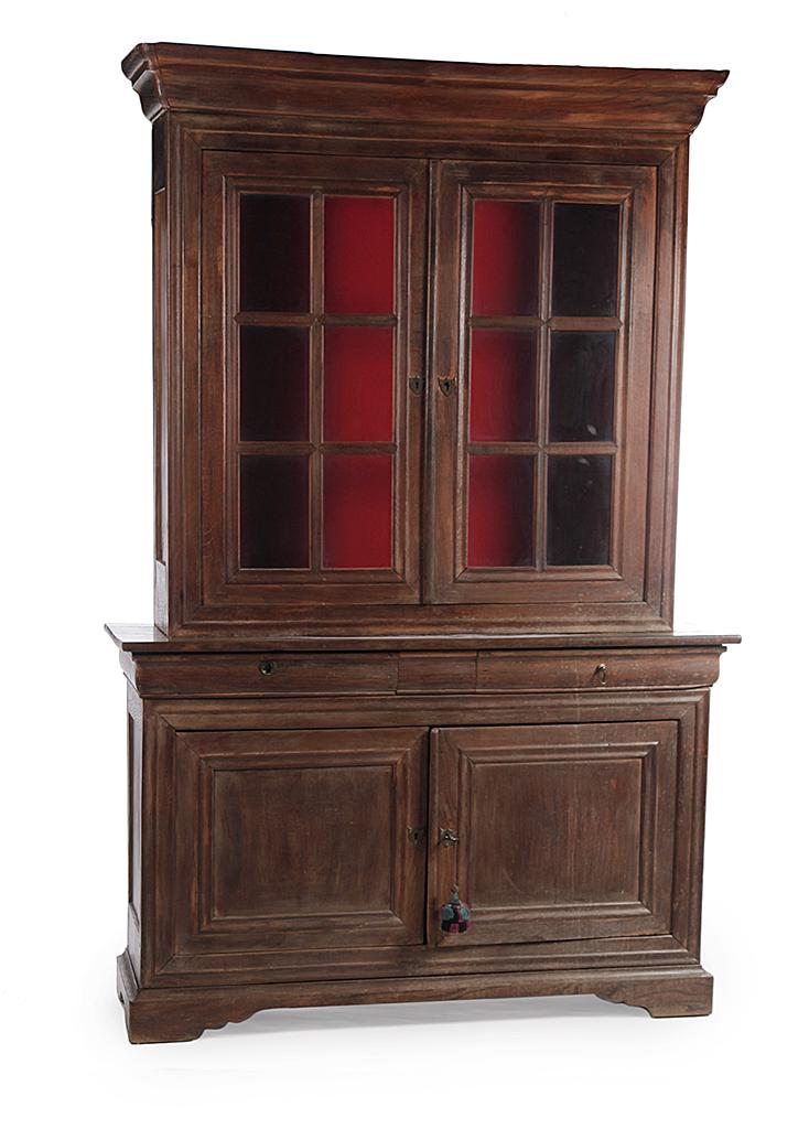ENGLISH CUPBOARD.: Mid 19th century, oak. Two piece with removable cornice. Top has two doors with twelve glass panes. Base has two dovetailed drawers with old, if not original, pulls above two doors. Interior shelves t