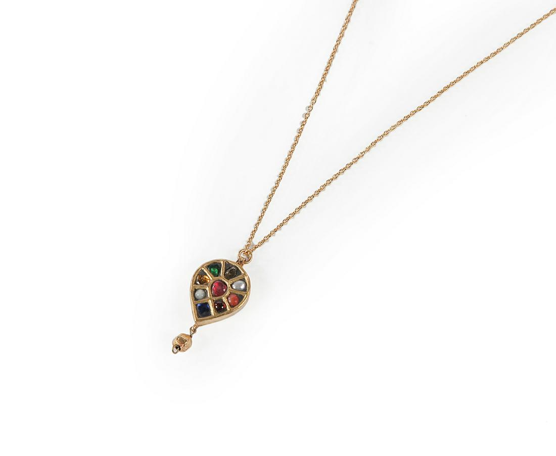 MUGHAL GEM-SET YELLOW GOLD PENDANT.: Indian, mid-late 20th century. 18K yellow gold, teardrop - shaped pendant (x-ray metal tested). Center pear-shaped ruby surrounded by multi-color gems including pearls, polki diamond slice, emerald, c