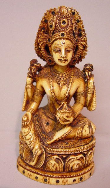 THREE INDIAN CARVED IVORY FIGURINES. A f