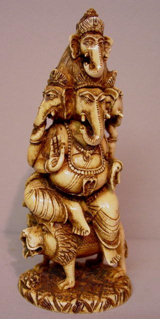 THREE INDIAN CARVED IVORY FIGURINES. A f - 2
