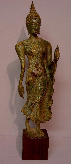 BRONZE BUDDHA. Standing figure with elon