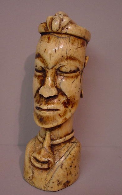 IVORY CARVED BUST. Carved tusk (hollow c