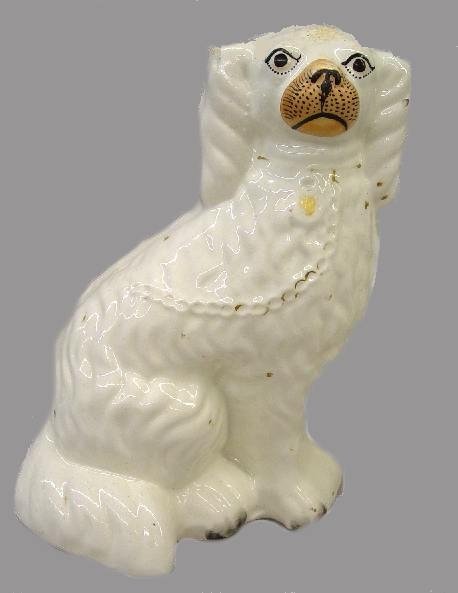 TWO STAFFORDSHIRE DOGS. Seated white spa