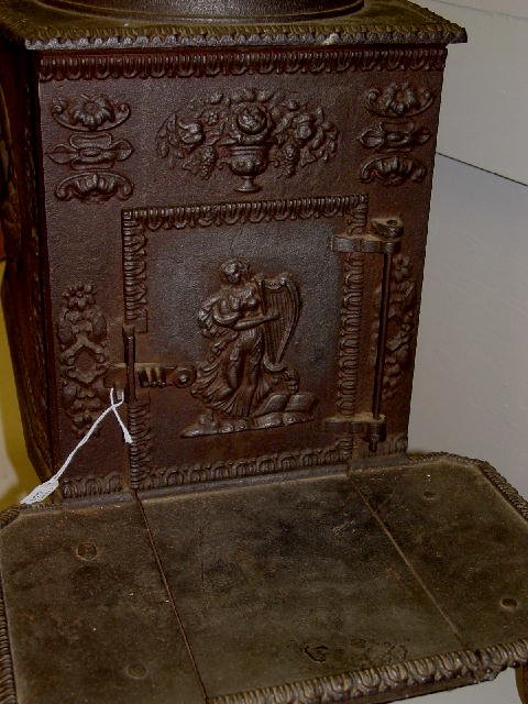 EARLY CAST IRON STOVE. Small size with v - 2