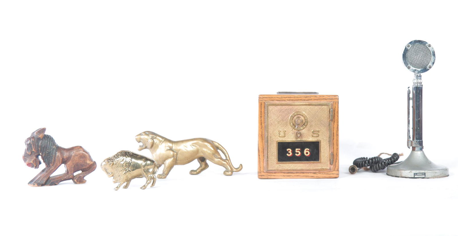 FIVE PIECE ECLECTIC GROUP.: Twentieth century. Post Office box door in oak case. Made into a bank with inlaid eagle half-dollar by Daniel Skowronski, 7"h. 7"w. 6.5"d., an Astatic Corp. Mod. No. D-104 chrome microphone, 12.25"h.,