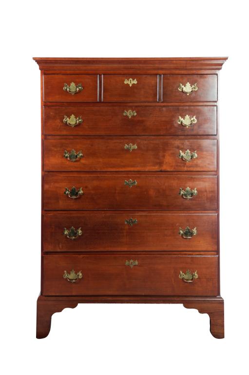 CHIPPENDALE TALL CHEST.: American, 4th quarter-18th century. Cherry with pine secondary. Dovetailed case, applied cornice molding, six overlapping drawers, top drawer has three faux fronts, solid ends, and bracket feet. 56"h.
