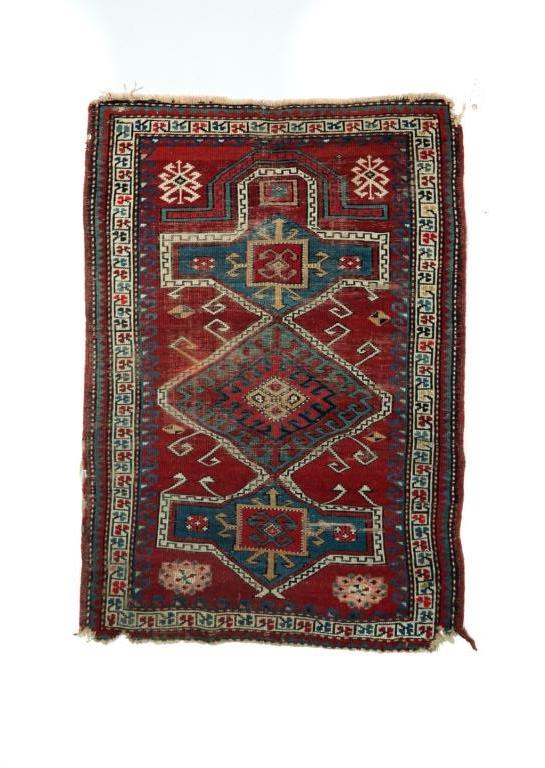 KARABAUGH PRAYER RUG.: First half-20th century. Blue medallions on red ground. Loss. 3' x 5'.