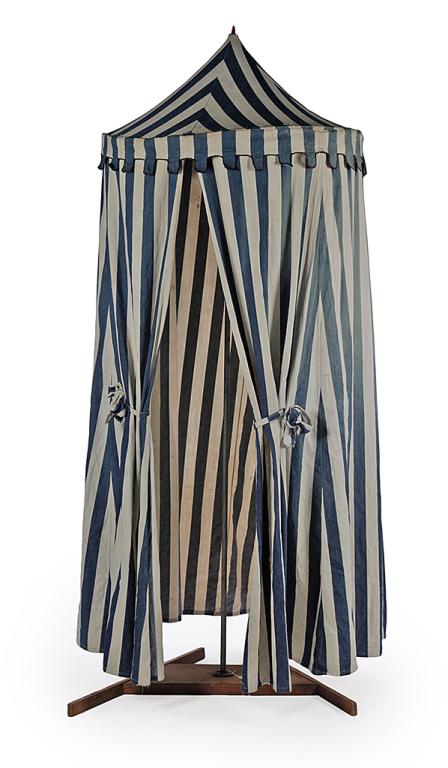 ODD FELLOWS TEMPLE TENT.: From an Ohio Odd Fellows lodge, ca. 1920. Blue and white striped canvas with ties. A few patches. On a replaced wooden base. 84”h. 42”d. Ex Clark Garrett (Ohio).