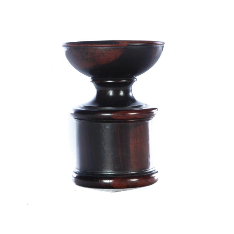 LIGNUM VITAE SANDER.: Probably American, mid 19th century. Turned with good form. Edge flake. 4.5"h.