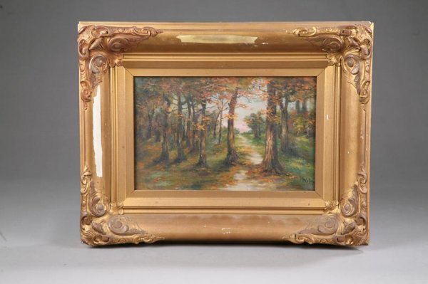 OIL ON CANVAS OF A FOREST. In a gilt decorated fr
