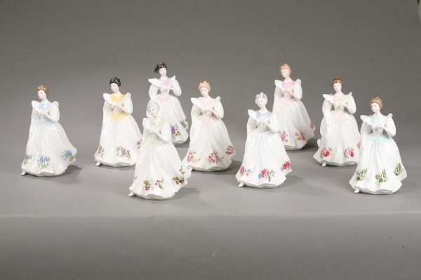 NINE ROYAL DOULTON FIGURE OF THE MONTH FIGURINES.