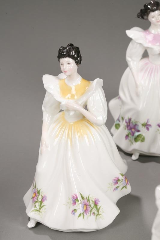 NINE ROYAL DOULTON FIGURE OF THE MONTH FIGURINES. - 5