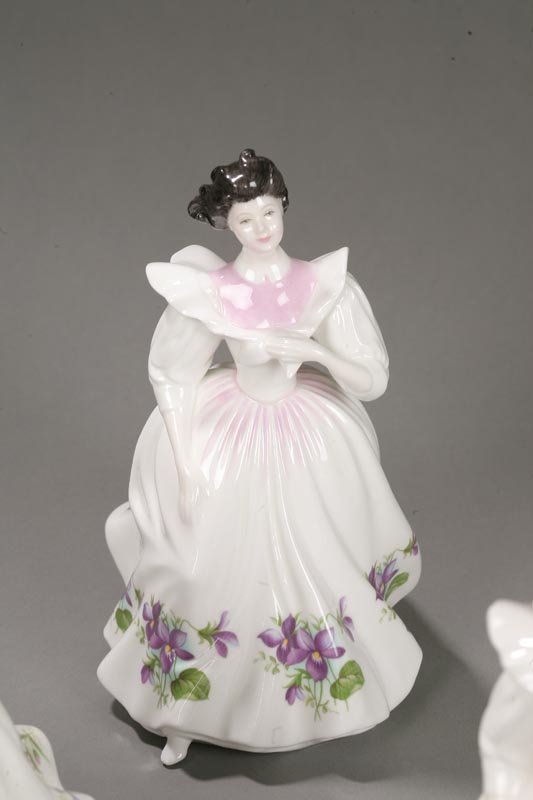 NINE ROYAL DOULTON FIGURE OF THE MONTH FIGURINES. - 6