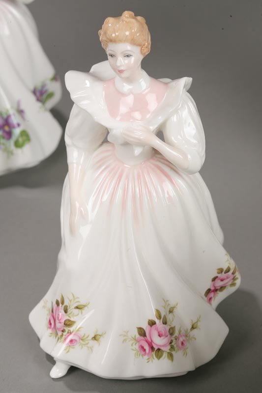 NINE ROYAL DOULTON FIGURE OF THE MONTH FIGURINES. - 7