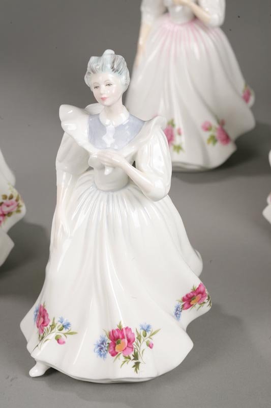 NINE ROYAL DOULTON FIGURE OF THE MONTH FIGURINES. - 8