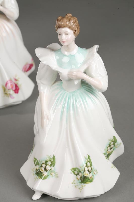 NINE ROYAL DOULTON FIGURE OF THE MONTH FIGURINES. - 9
