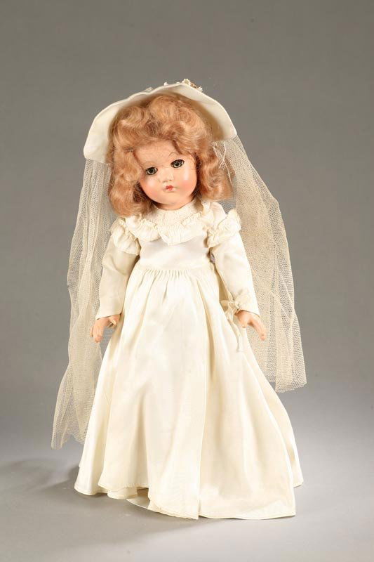 EFFANBEE COMPOSITION ANNE SHIRLEY BRIDE, 15". Ma: EFFANBEE COMPOSITION ANNE SHIRLEY BRIDE, 15". Marked on back: "EFFANBEE Anne Shirley". Clear green sleep eyes, mohair wig with hairnet and original bride's dress and veil. Composition is in excellent