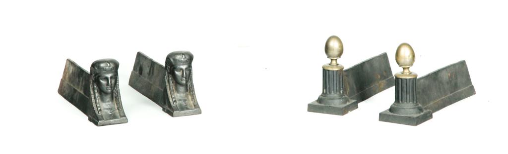 TWO PAIRS OF CAST IRON ANDIRONS.: American, mid 19th century. Egyptian Revival with sphinx heads, 6"h. 16"d. And fluted column with brass egg-shaped finials, 7.5"h. 14"d.