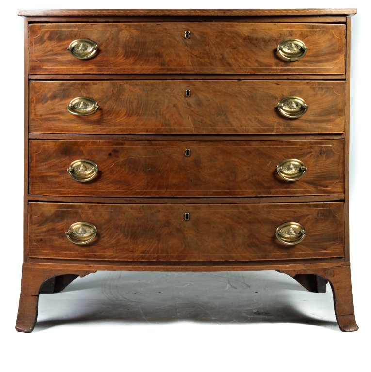 HEPPLEWHITE BOWFRONT FOUR-DRAWER CHEST.: England, ca. 1800. Mahogany, pine secondary, line inlays, solid ends, dovetailed drawers, and French feet. 38"h. 40.5"w. 23"d.