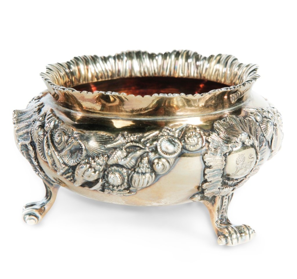 ENGLISH SILVER FOOTED BOWL.: London hallmarks, 1901 by "Hunt & Roskell". Heavily decorated with seashells, scrolled feet and vermeil surface. 2.5"h. 4.5"d. Approx. 11 ozt.