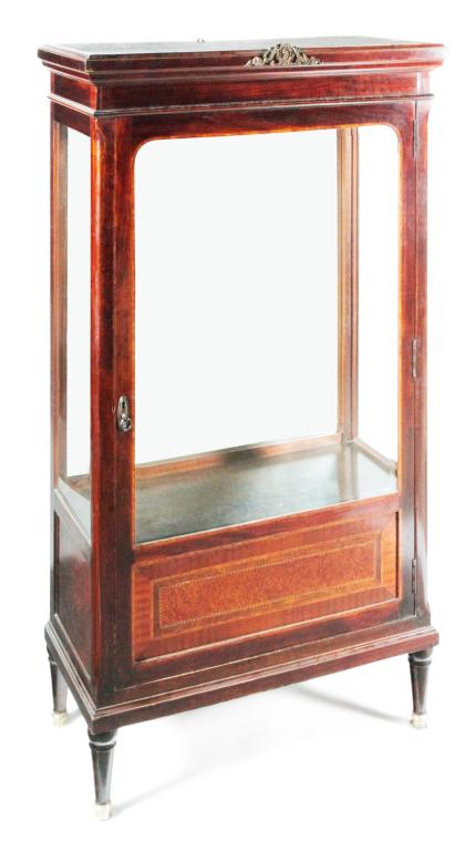 LOUIS XVI STYLE CURIO CABINET.: European, ca. 1900. Mahogany with banded inlays, molded cornice, beveled glass side panels and door, turned legs with brass cup feet. 69.5"h. 38"w. 18"d.