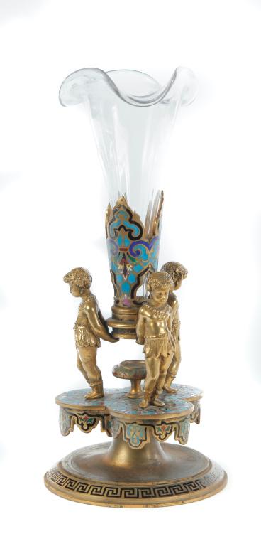 FRENCH CHAMPLEVE VASE.: Early 20th century. Figural gilt bronze holder with blue enameld decoration. Replaced trumpet vase. 9.5"h.
