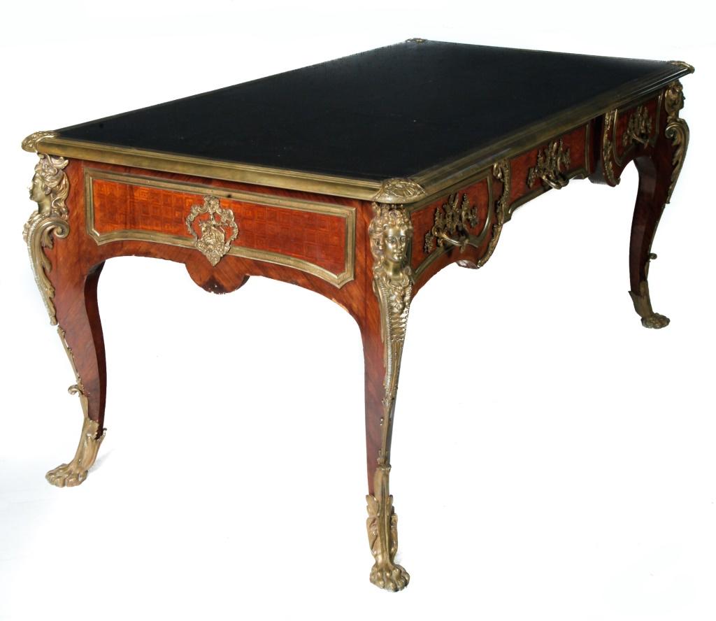 LOUIS XV BUREAU PLAT WITH ORMOLU.: French, 2nd half 18th century. Mahogany with oak secondary, black leather top with brass bonding, three dovetailed drawers with marquetry fronts, three false drawers, and ends with marquetry inlays, f