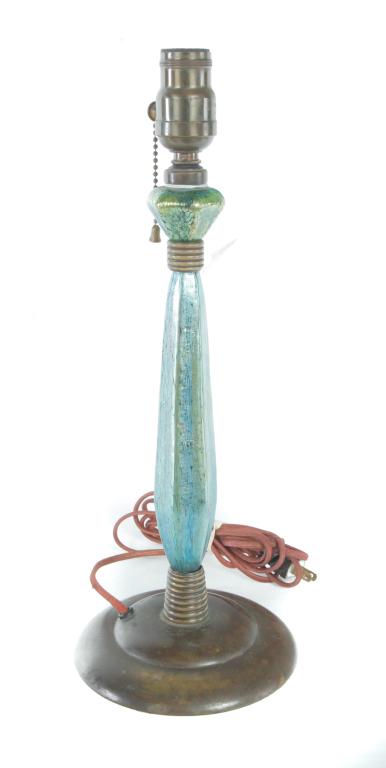 LOETZ TYPE TABLE LAMP.: European, 1st quarter 20th century. Two piece green iridized stem with bronze beehive separators and round base. 16.5"h.