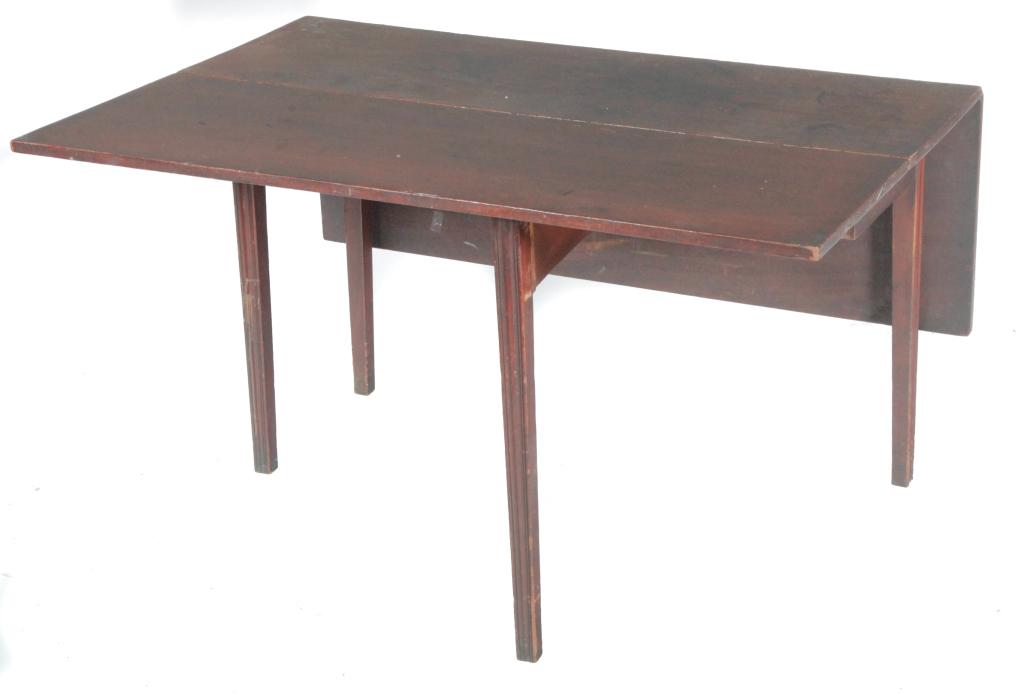 TRANSITIONAL SWING-LEG DROPLEAF TABLE.: England, ca. 1800. Chippendale to Hepplewhite, mahogany with pine secondary and tapered legs with routed faces. 27.5"h. 48"w. Opens to 47.5" with 16" leaves.