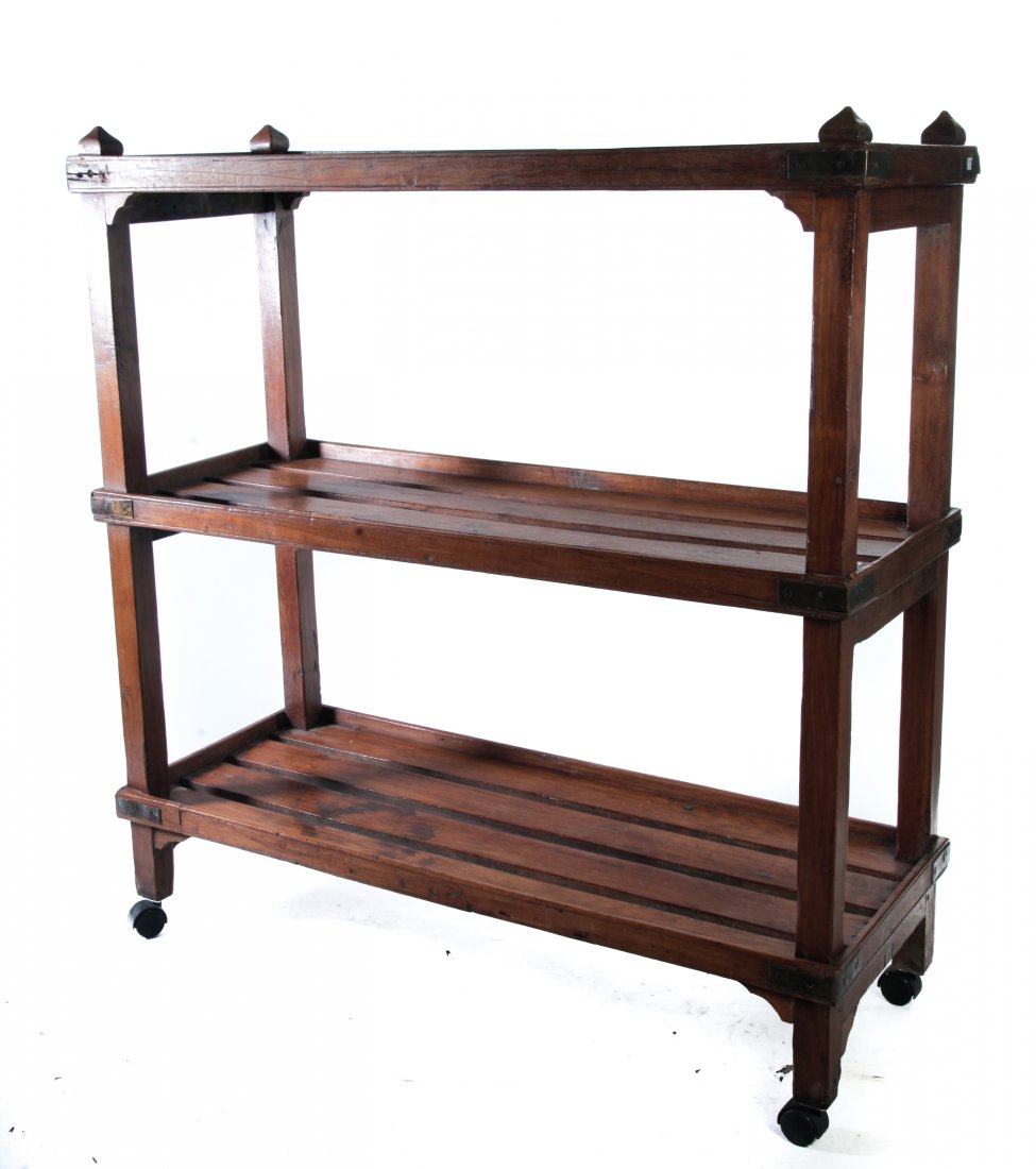 EUROPEAN BAKERY RACK.: Ca. 1900, yew wood, square posts, square onion finials, slat sides and shelves with gallery edges, and brass corners. 52.5"h. 49"w. 19"d.