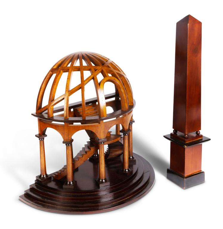 TWO ARCHITECTURAL MODELS.: China, late 20th century, mixed woods. Made by "Architectural Models". Demi-dome, 16"h. 18"w. 9.75"d. and an obelisk. Flakes. 20"h.