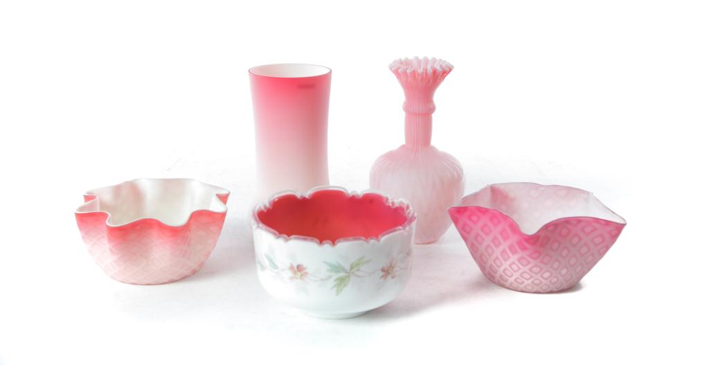 FIVE PIECES OF VICTORIAN ART GLASS.: American, 4th quarter 19th century. Two pink diamond quilted bowls, 2.25"h. 4.5"dia. Herringbone pink vase, 6.75"h. Pink celery, 6.5"h. And pink cased in white bowl with enameled flowers, 3"h. 5.25"di