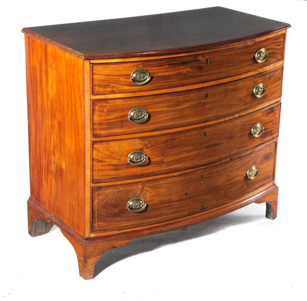 HEPPLEWHITE BOWFRONT CHEST.: Probably American, ca. 1800. Mahogany with pine secondary, routed top edge, four dovetailed drawers with applied beaded edges and string inlays, solid ends, and bracket feet. 36.5"h. 41"w. 23"d.