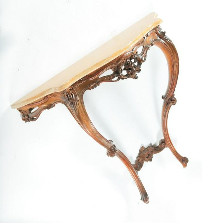 LOUIS XV STYLE CONSOL TABLE.: European, 1st half 20th century. Faux marble top and foliate carved and gilded base. 36"h. 38"w. 12"d.