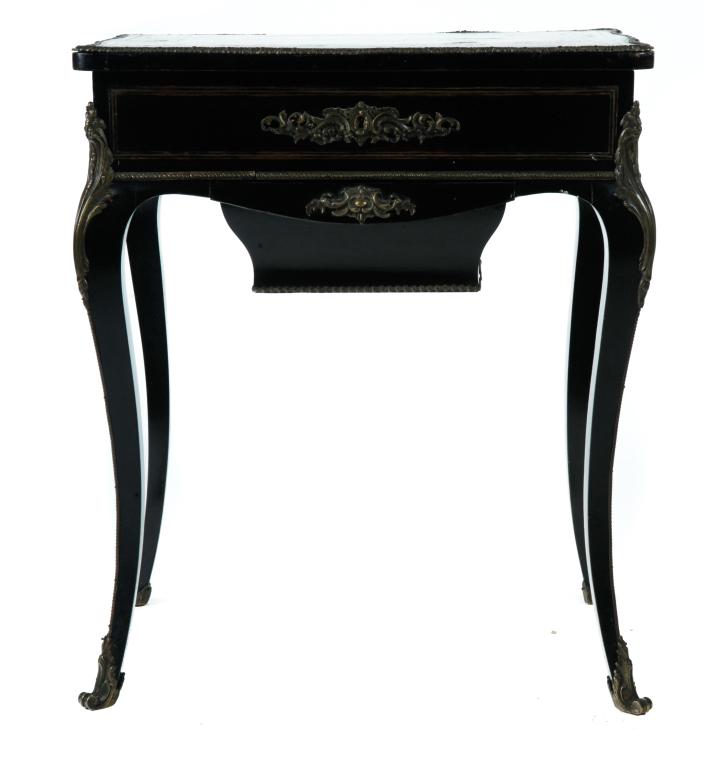 BOULE SEWING TABLE.: France, 1st quarter 19th century. Ebonized rose wood, lid with intricate brass inlay with red lacquer infill, brass lime inlay, beading and ormolu mounts, underside of lid is mirrored, lower drawer fo