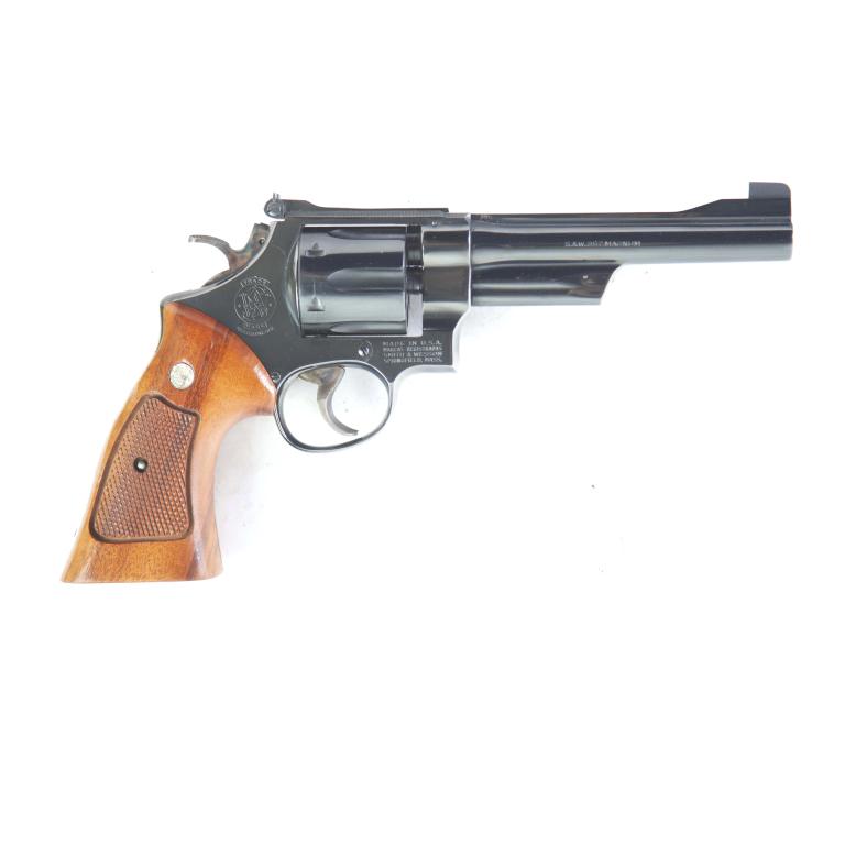 *SMITH & WESSON MODEL 27-2 .357 MAGNUM REVOLVER: SMITH & WESSON MODEL 27-2 .357 MAGNUM REVOLVER. American, ca. 1977. Blued frame, cylinder, and barrel, checkered walnut grips, fluted cylinder, and stamped barrel, barrel length 6", 11.5" overall. S/n