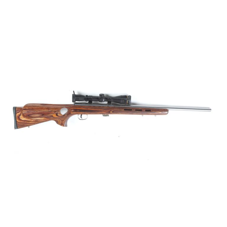 *SAVAGE ARMS CO. MARK II BTVLSS .22 LR RIFLE: SAVAGE ARMS CO. MARK II BTVLSS .22 LR RIFLE. American, 21st century. Left-handed laminated thumbhole, ventilated stock, AccuTrigger, and stainless steel barrel and receiver. 21" barrel length,39.75" o