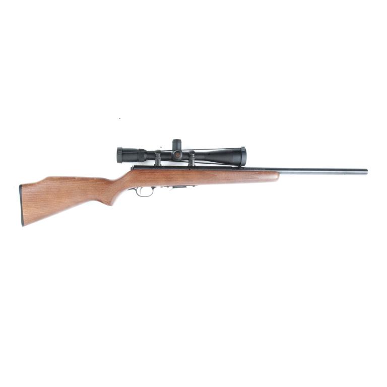 *SAVAGE ARMS CO. MODEL 93R17 LH .17 HMR RIFLE: SAVAGE ARMS CO. MODEL 93R17 LH .17 HMR RIFLE. American, 21st century. Left-hand bolt action, blued finish, and checkered walnut stock. 21" barrel length, 40" overall. S/n 0427995. Includes mounted Nic