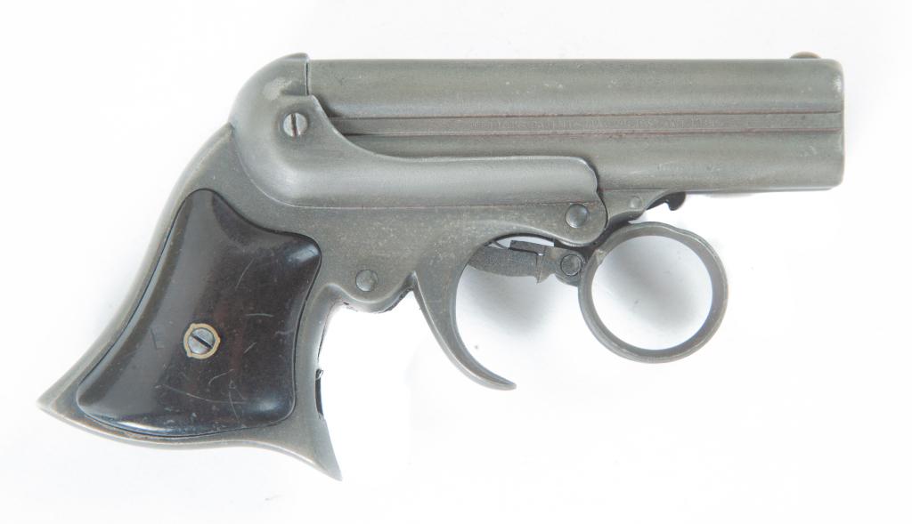 E. REMINGTON AND SONS ELLIOT DERRINGER .32 CALIBER: E. REMINGTON AND SONS ELLIOT DERRINGER .32 CALIBER FOUR-BARREL GUN. American, 2nd half-19th century. Four stationary rifled barrels with rotating firing pin, hardwood grips, ring trigger, and break to