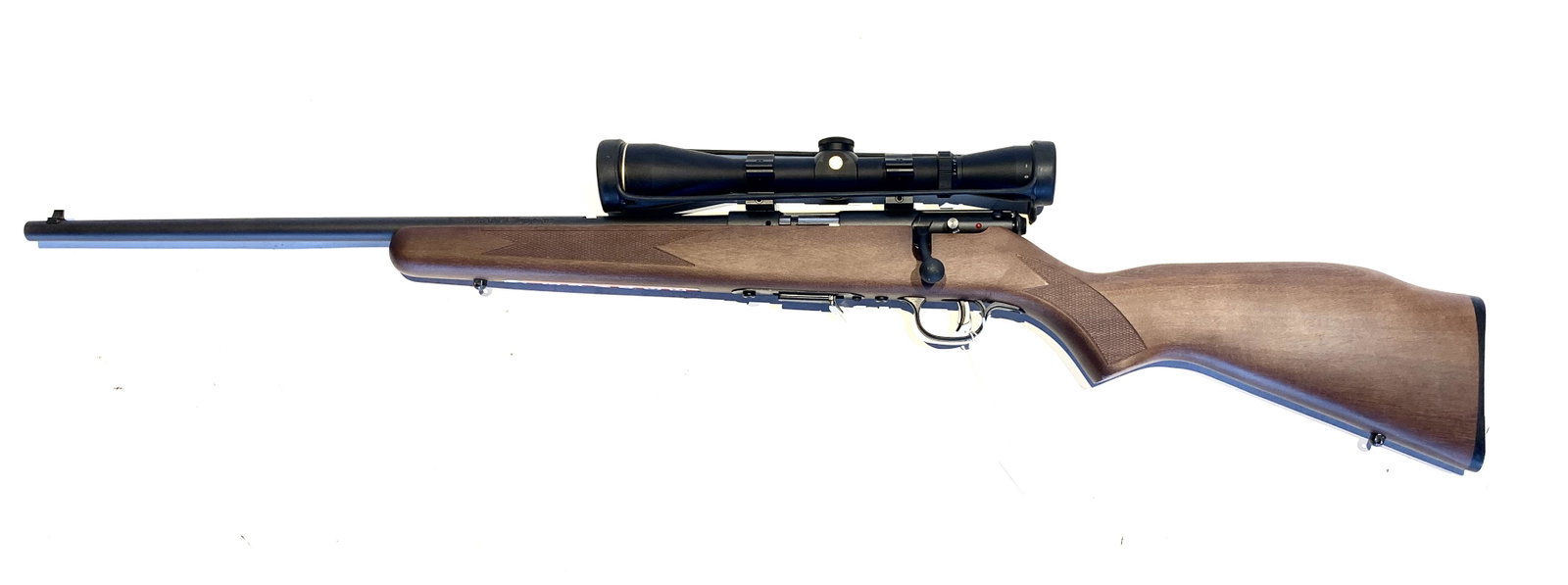 *SAVAGE ARMS CO. MODEL 93 GL .22 WMR RIFLE: SAVAGE ARMS CO. MODEL 93 GL .22 WMR BOLT ACTION RIFLE. American, 21st century. Left hand bolt action with walnut stained hardwood stock. 20.75" barrel length, 40" overall. S/n 2378645. Includes mounte
