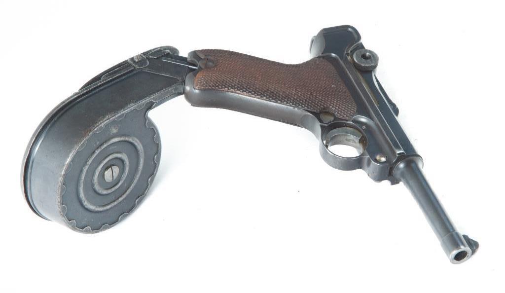 *MAUSER S/42 'G' DATE 9MM LUGER SEMI-AUTO PISTOL: MAUSER S/42 'G' DATE 9MM LUGER SEMI-AUTOMATIC PISTOL. Germany, 1935. Checkered grips, blued frame and barrel, chamber marked with "G" for the date of manufacturing, front of toggle marked S/42 for the