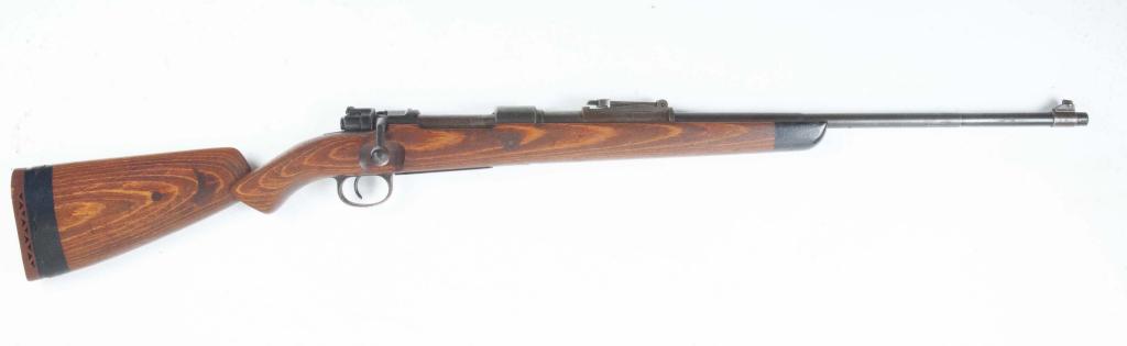*GERMAN MAUSER MODEL 98 BOLT ACTION 7.92MM RIFLE: GERMAN MAUSER MODEL 98 BOLT ACTION 7.92MM RIFLE. Second quarter-20th century Blued barrel and receiver. Hardwood stock. Barrel stamped with Imperial Eagle and swastika proof mark. S/n. 26447. Barrel l