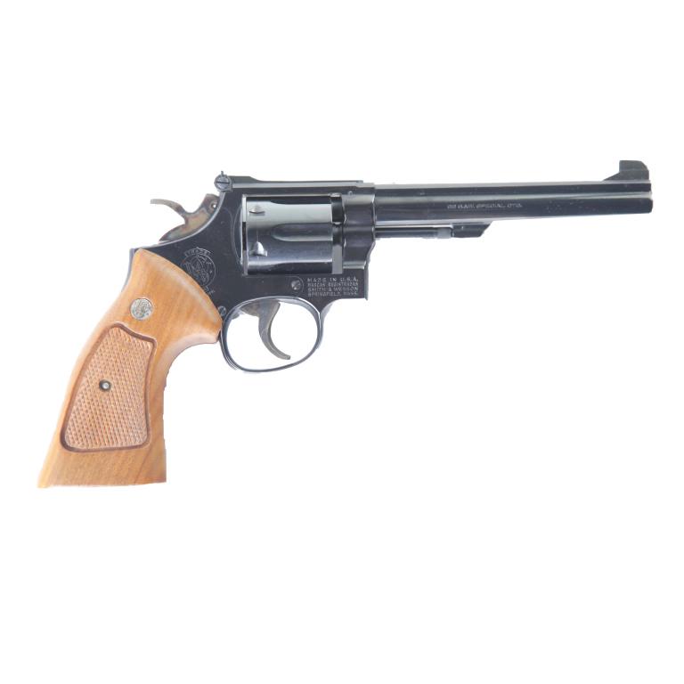 *SMITH & WESSON MODEL 14-4 .38 SPECIAL REVOLVER: SMITH & WESSON MODEL 14-4 .38 SPECIAL REVOLVER. American, 3rd quarter-20th century. Blued frame, fluted cylinder, and checkered walnut grips. 6" barrel length, 11.5" overall. S/n 34K9158. Includesorig