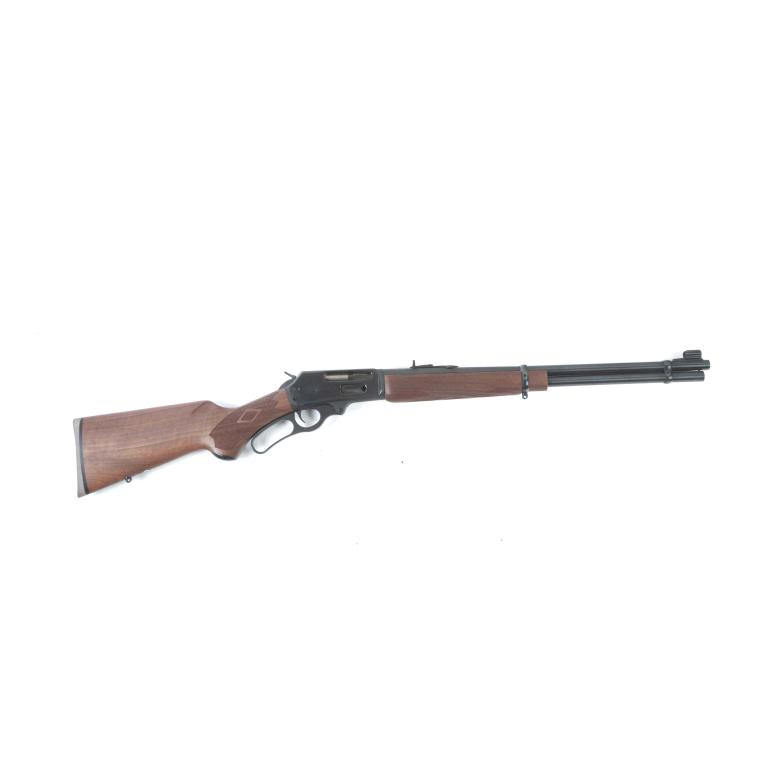 *MARLIN FIREARMS MODEL 336C .30-30 W LEVER ACTION RIFLE: MARLIN FIREARMS MODEL 336C .30-30 W LEVER ACTION RIFLE. American, 3rd quarter-20th century. Blued finish, tapered round barrel, pistol-grip stock, and checkered walnut stock. 20" barrel length, 38.5"