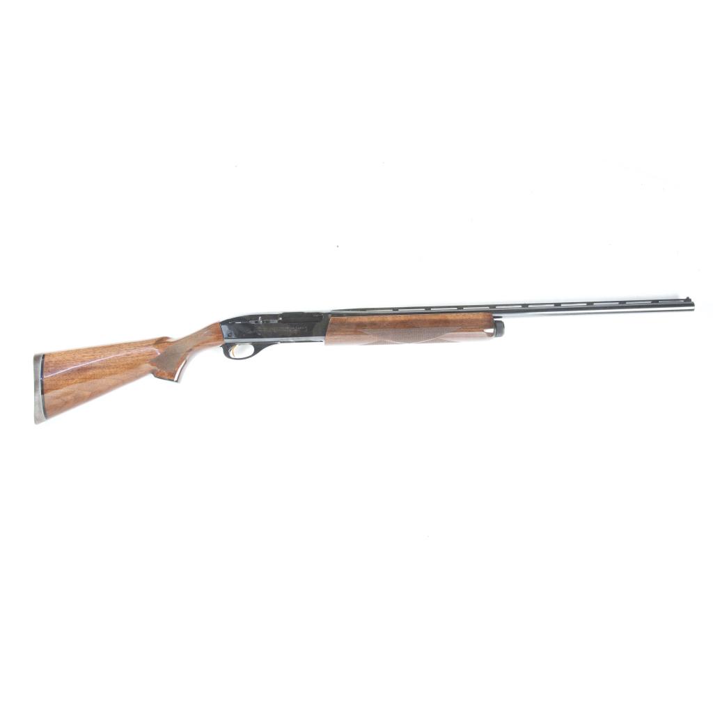 *REMINGTON ARMS 11-87 DALE EARNHARDT 20GA SHOTGUN: REMINGTON ARMS 11-87 PREMIER DALE EARNHARDT COMMEMORATIVE 20 GAUGE SHOTGUN. American, 21st century. Ventilated rib barrel, blued finish, and checkered walnut stock. Engraved on receiver is a likeness 