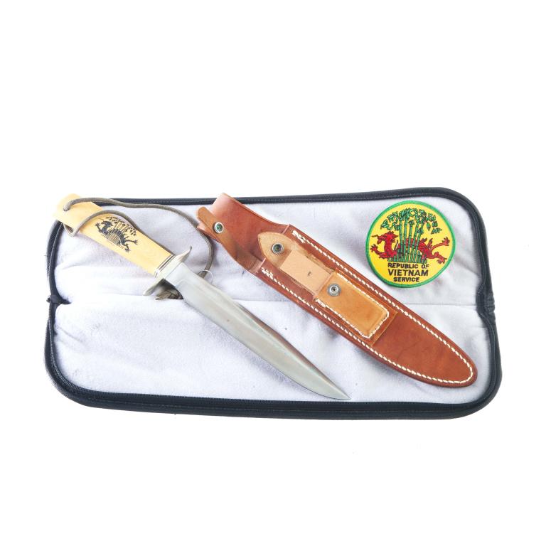 RANDALL KNIVES MODEL 1 1ST ISS VIETNAM VETERAN 8": RANDALL KNIVES MODEL 1 - 1ST ISSUE VIETNAM VETERAN 8". CA. 1987. Stainless steel blade etched VIETNAM VETERAN, double nickel silver hilt, red, white and blue spacers, and yellow Westinghouse micarta h